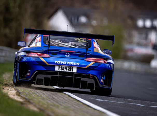 blue Mercedes AMG of Toyo Tires on the Nürburgring race track in Germany